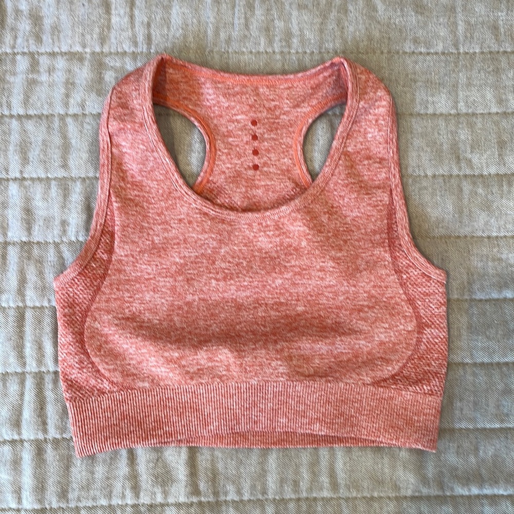 ACTA crop top/sports bra with back cut-out. Salmon, small